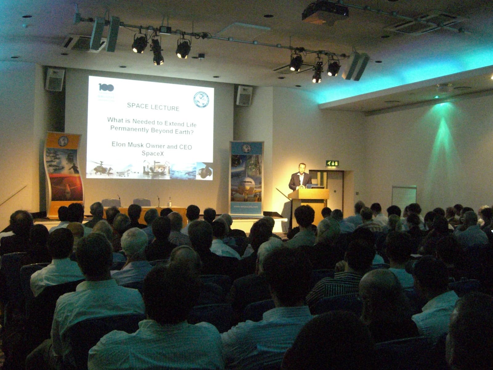 Elon Musk as Tesla CEO with Roadster